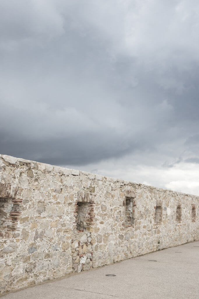 Wall and storm clouds in Bastion St Jaume, Antibes, France by Cattie Coyle Photography