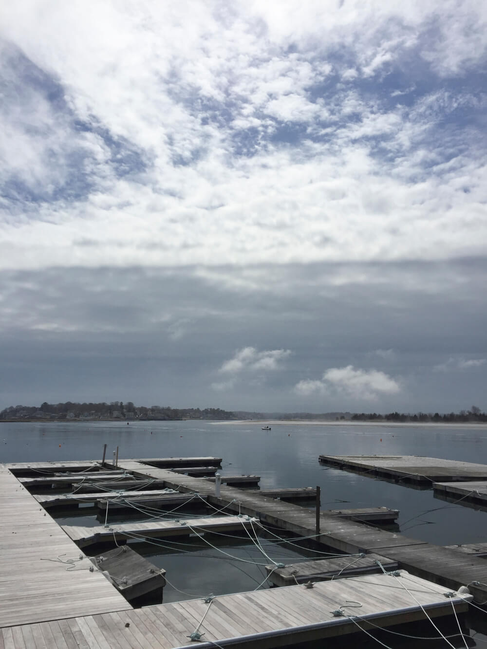 Docks and clouds, Annisquam, MA by Cattie Coyle Photography. © 2018, all rights reserved.