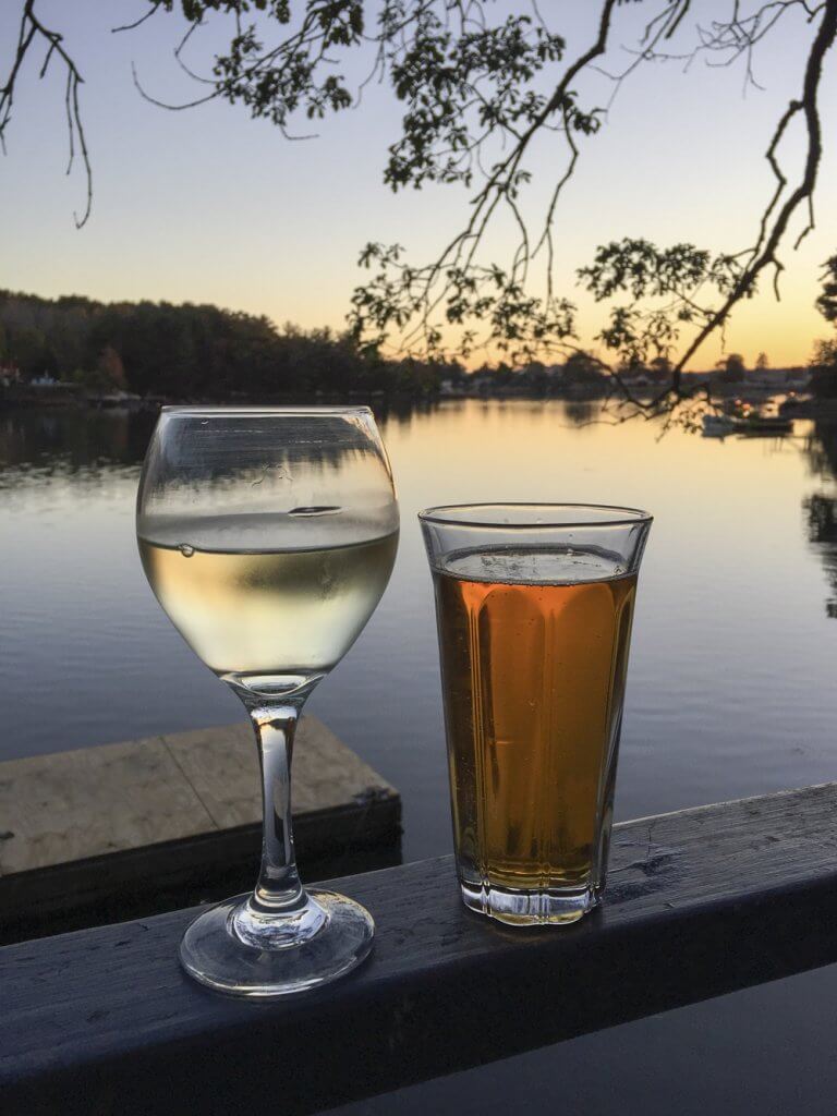 Slow living in Annisquam, MA. Evening drinks on the dock | Cattie Coyle Photography