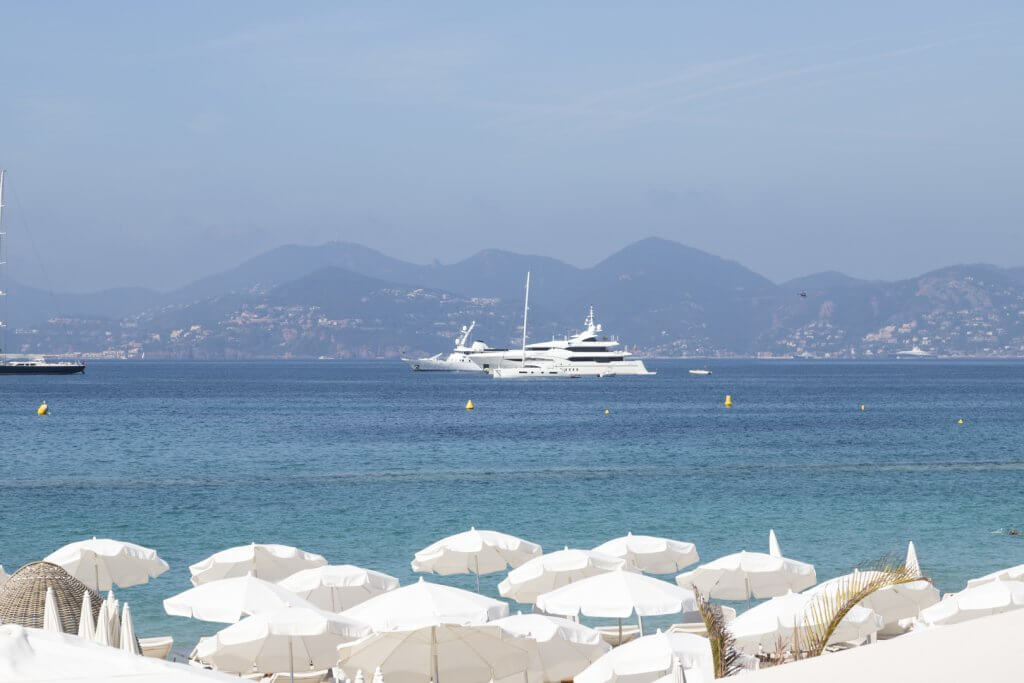 Beach umbrellas, yachts, and views in Cannes, France, by Cattie Coyle Photography