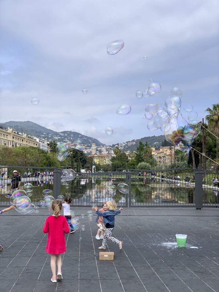 Children and soap bubbles outside the Promenade du Paillon, Nice France | Cattie Coyle Photography