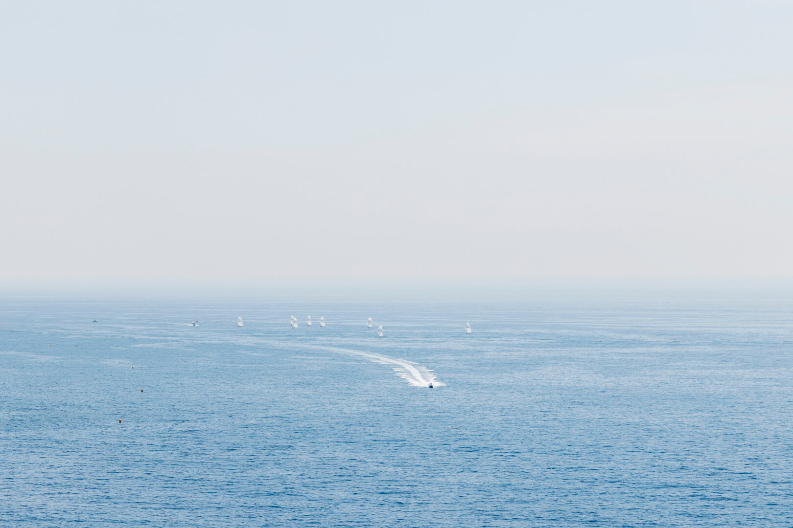 View of the Mediterranean and boats from the Basse Corniche, French Riviera, by Cattie Coyle Photography. © 2019, all rights reserved.