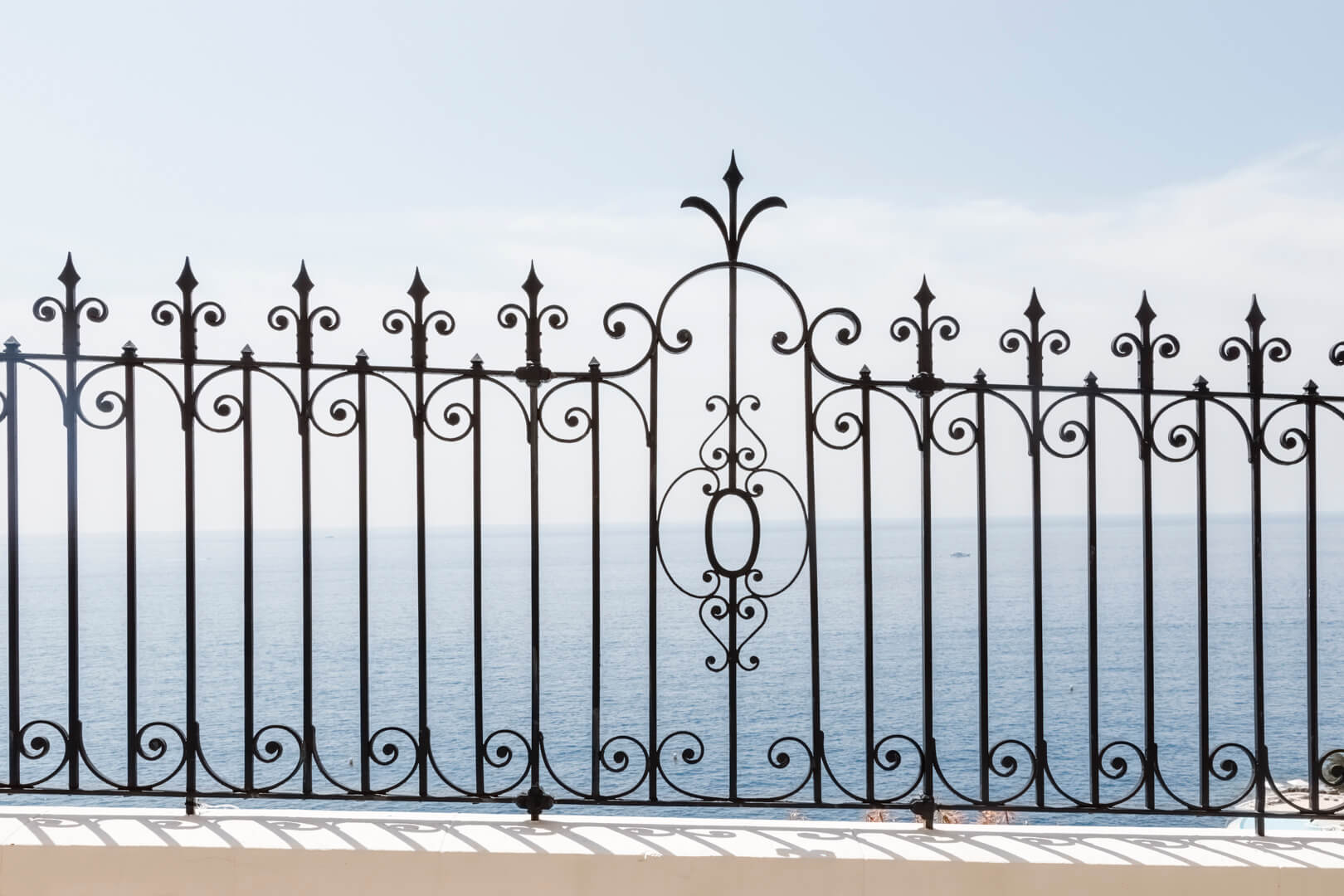 Ironwork and views along Avenue Raymond Poincaré, Eze-Bord-de-Mer, France, by Cattie Coyle Photography. © 2019, all rights reserved.