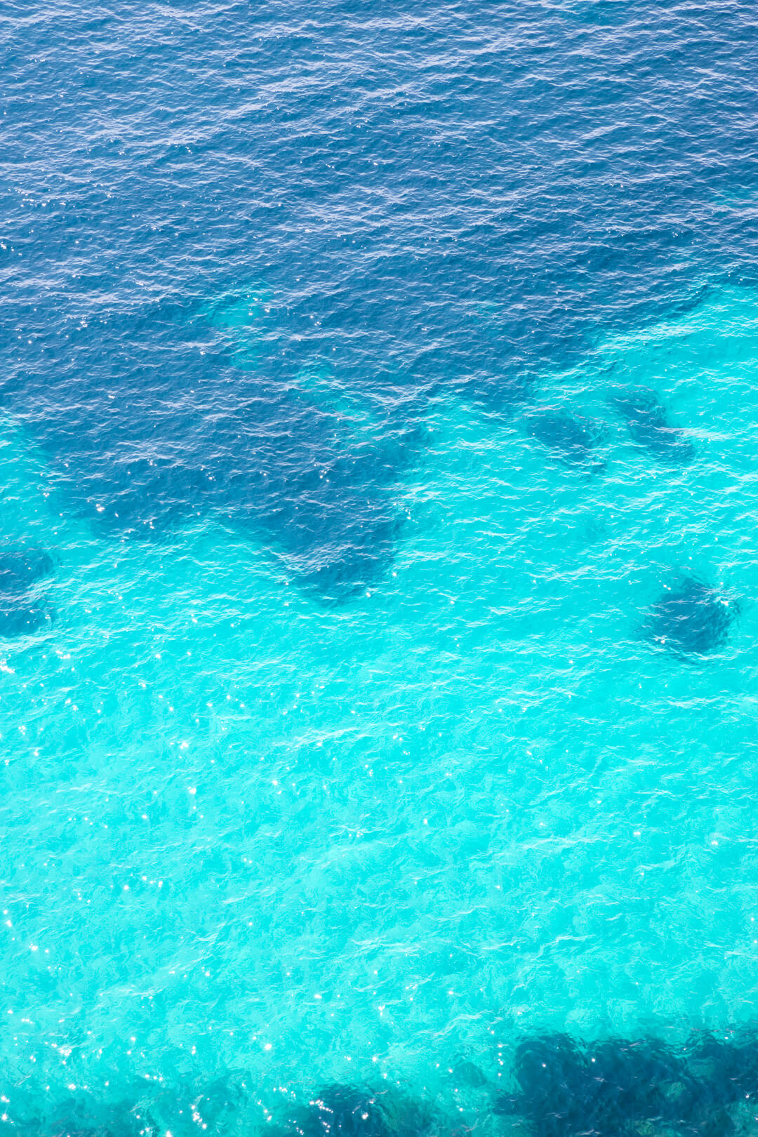 Turquoise water in the Mediterranean Sea by Cattie Coyle Photography. © 2019, all rights reserved.