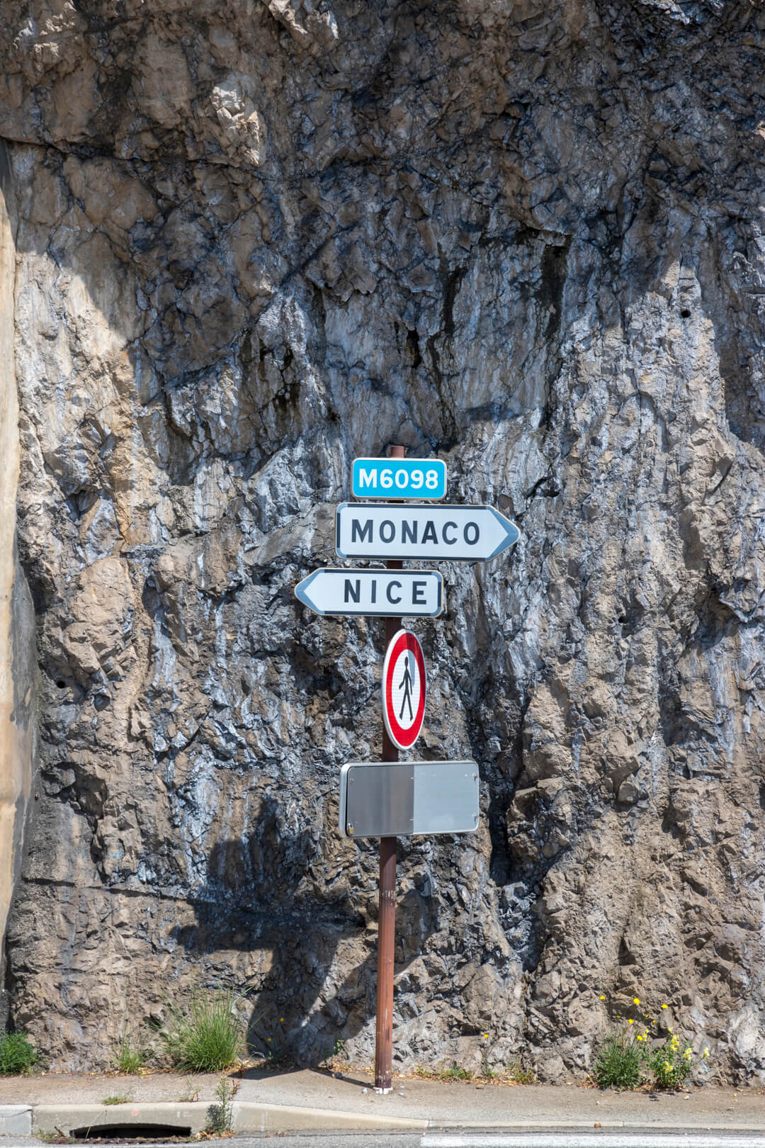 Street signs along the Basse Corniche, French Riviera, by Cattie Coyle Photography. © 2019, all rights reserved.