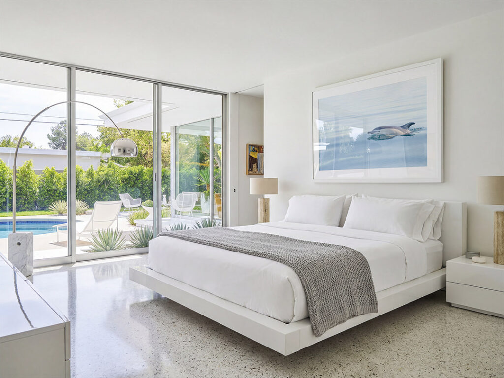 Dolphin art print by Cattie Coyle Photography in bedroom. © 2024, all rights reserved.