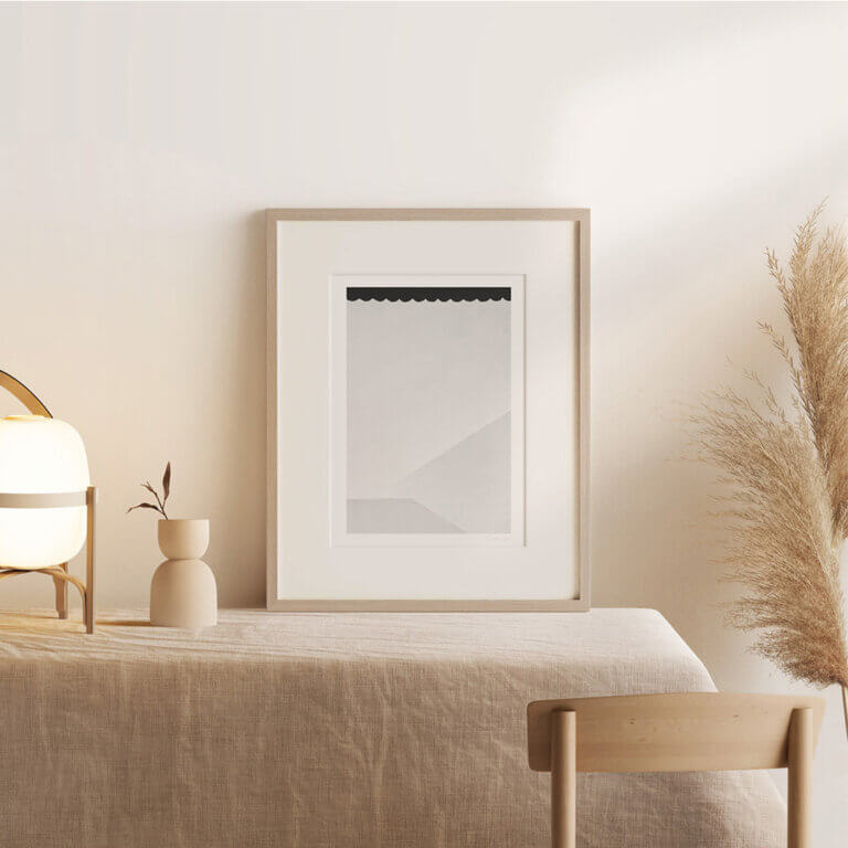 Shadow - Black and white abstract art print by Cattie Coyle Photography on table. Copyright 2018, all rights reserved.