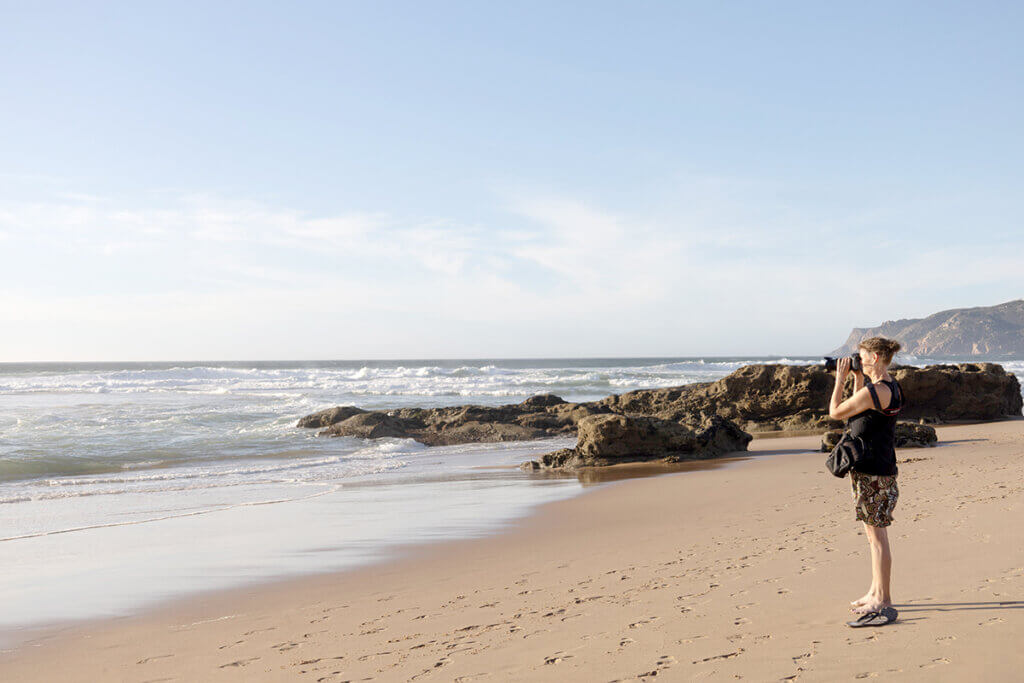 Coastal travel & fine art photographer Cattie Coyle at Praia do Guincho, Portugal